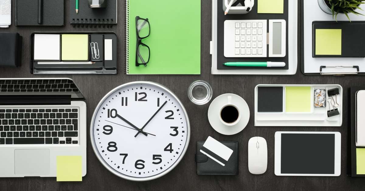 A tidy desk with tech gadgets and stationery, mirroring the organization of a mobile productivity app.